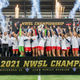 LOUISVILLE, KY - NOVEMBER 20: The Washington Spirit raises the NWSL trophy after a game between Chicago Red Stars and Washington Spirit at Lynn Family Stadium on November 20, 2021 in Louisville, Kentucky. (Photo by Brad Smith/ISI Photos/Getty Images)